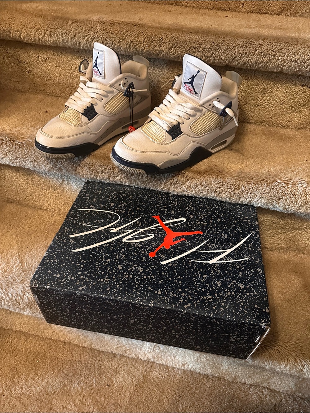 Jordan Off-White and Black Retro 4 Sneakers